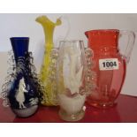 Four pieces of pâte-sur-pâte glassware comprising two vases and jugs