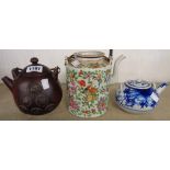 Three Oriental teapots comprising Chinese Yixing Zodiac, blue and a white, and a Famille Rose