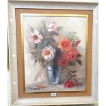 Beppe Grimani: a vintage framed oil on canvas still life with vase of roses - signed