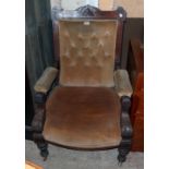 An Edwardian incised walnut framed drawing room armchair with remains of button-back upholstery, set