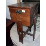 A 12 1/2" early 20th Century polished oak work table, with fold-out top and drawer fitted