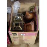 A box containing two wooden ducks, photograph frames, lanterns, etc.