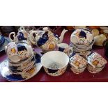 A Gaudy Welsh twelve place tea set including teapot, jug and sucrier