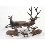 A collection of cast metal deer figures, mostly painted - various condition