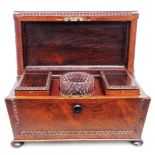 A 13" Victorian rosewood sarcophagus shaped twin compartment tea caddy with beaded borders, two