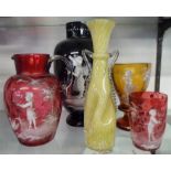 Five pieces of pâte-sur-pâte glassware including bulbous vase, amber glass, pedestal, wine glass
