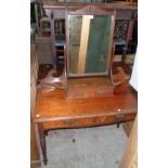 A 3' 6" late Victorian pitch pine dressing table with swing mirror, central trinket drawer and