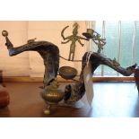 An Indian desk stand made from a pair of horns with brass Hindu ornamentation - a/f