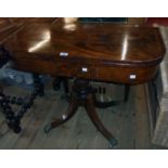 A 36" 19th Century flame mahogany and strung fold-over card table with later baise, set on turned