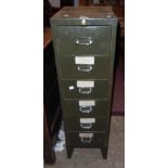An 11 1/4" vintage metal filing cabinet with green painted finish and flight of six drawers