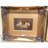 An ornate gilt framed and slipped oil on panel, depicting a barn interior with three children