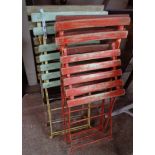 A set of four French painted metal folding frame and wooden slatted bistro chairs