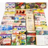 Forty booklets of Tetley tea cards and cigarette cards