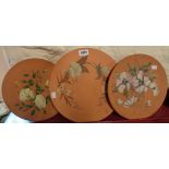 Three Watcombe Pottery terracotta plaques with floral decoration
