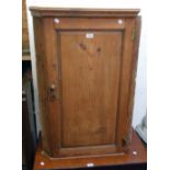 A 26" 19th Century waxed pine wall hanging corner cupboard, with painted interior and drawers