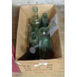 Eight antique glass bottles