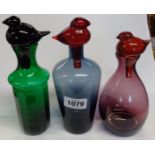 Three art glass bird stopper vases