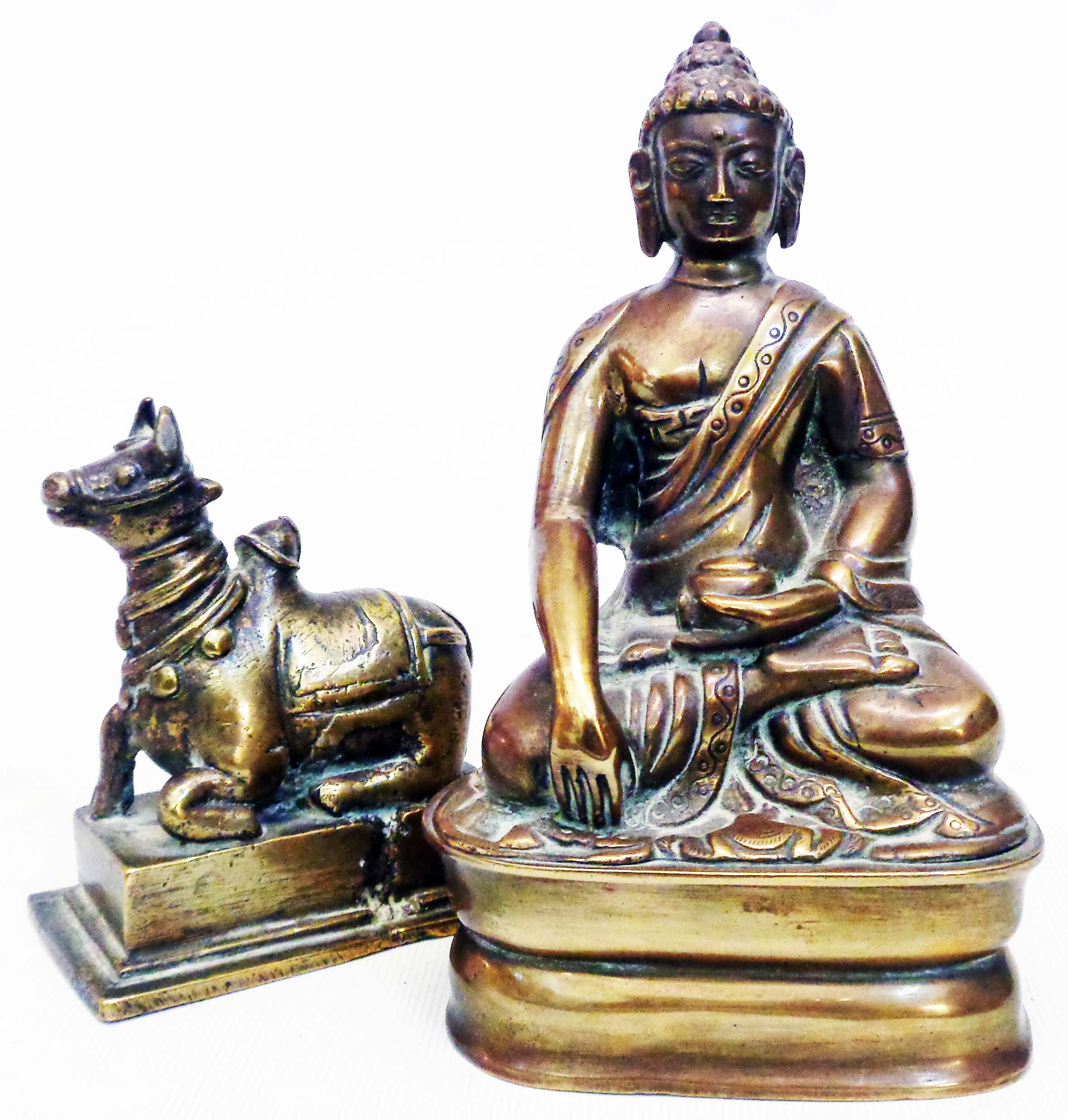 A brass Buddha in lotus position - sold with a solid brass bull set on plinth base