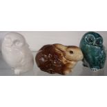 Three pieces of Poole Pottery comprising two owls and a rabbit