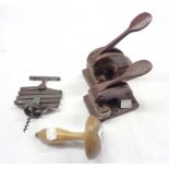 An Eclair concertina corkscrew, two address embossers and a darning mushroom