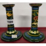 A pair of Torquay Pottery candlesticks