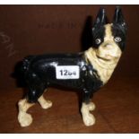 A modern reproduction painted cast iron Boston terrier pattern doorstop