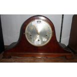 A 20th Century mahogany cased Napoleon hat mantel clock with beaded decoration and eight day chiming