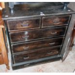 A 31" early 20th Century stained pine chest of two short and three long graduated drawers, set on