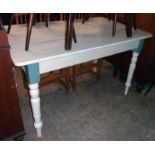 A 4' 6" Victorian later painted pine kitchen table with drawer to one end, set on turned legs