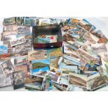 A tin containing a collection of mainly mid 20th Century postcards including topographic, travel,