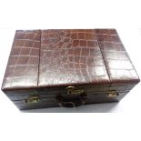A 1950's crocodile effect leather gentleman's dressing case with fold-out mirrored compartment and