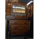 A 36" Edwardian walnut dressing chest with triple mirror, flanking pierced supports, trinket drawers
