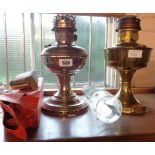 Two Aladdin table lamps with chimneys - one chimney boxed