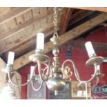 A brass six branch chandelier