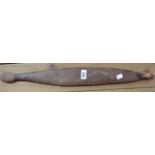 An Australian Aboriginal carved wood Woomera spear thrower with geometric decoration