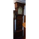 A 19th Century flamed mahogany cross banded and beaded longcase clock, the 13" painted arched dial