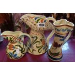 Three pieces of Aller Vale Pottery comprising a Persian pattern jug, another and a vase