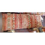 A Morrocan long bolster cushion