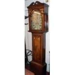 A 19th Century mahogany and strung longcase clock, the 13" painted arched dial with remains of