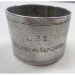 A First World War Zeppelin souvenir napkin ring made from the wreckage of the L.32 that was shot
