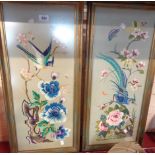 A pair of Oriental embroidered panels depicting a swallow and a pheasant - framed