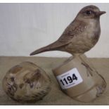 A Poole Pottery bird on a flower pot - sold with a sleeping dormouse