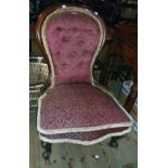 A Victorian walnut part show frame spoon back parlour chair with burgundy repeat pattern tapestry