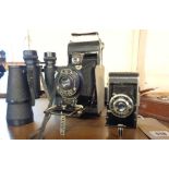 A cased Kodak Pocket 1A bellows camera, an Agfa Billy Record, and a Chinon BF200DB - sold with a