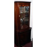 A 27" reproduction mahogany corner cabinet with glazed and mirrored top section over a cupboard