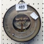 A 5 1/4" diameter 19th Century brass fob cased holosteric barometer/thermometer with visible aneroid