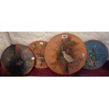 Four Watcombe Pottery terracotta plaques with pained bird decoration
