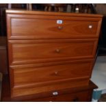 A 30" retro style teak effect chest of three long graduated drawers