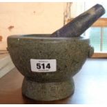 A composite stone pestle and mortar