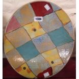 A Dartington Pottery Quilt pattern dished plate - initialled PT for Petra Tilly and stamped